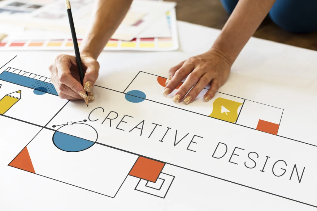 Creative Design Services: The Ultimate Guide creative design designer man working Bolt Creatives Creative Design Services: The Ultimate Guide creative design designer man working Bolt Creatives